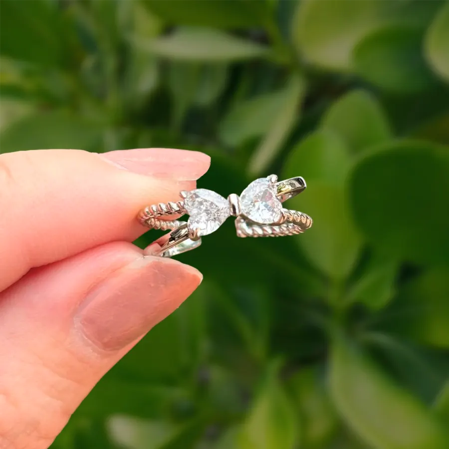 Anillo Plateado Moño de Zirconias Chapa de Oro