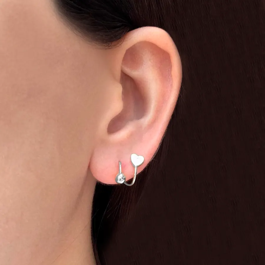 Aretes Plateados Vuelta de Corazon Chapa de Oro