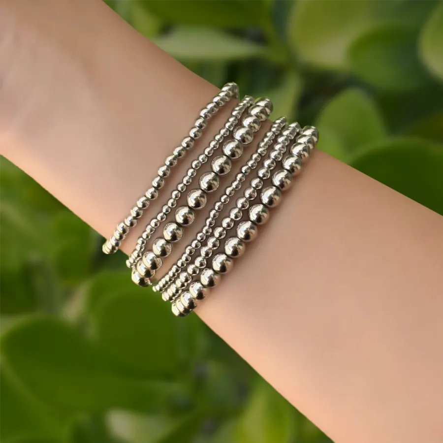 Set Pulseras Bolitas Plateadas Chapa de Oro